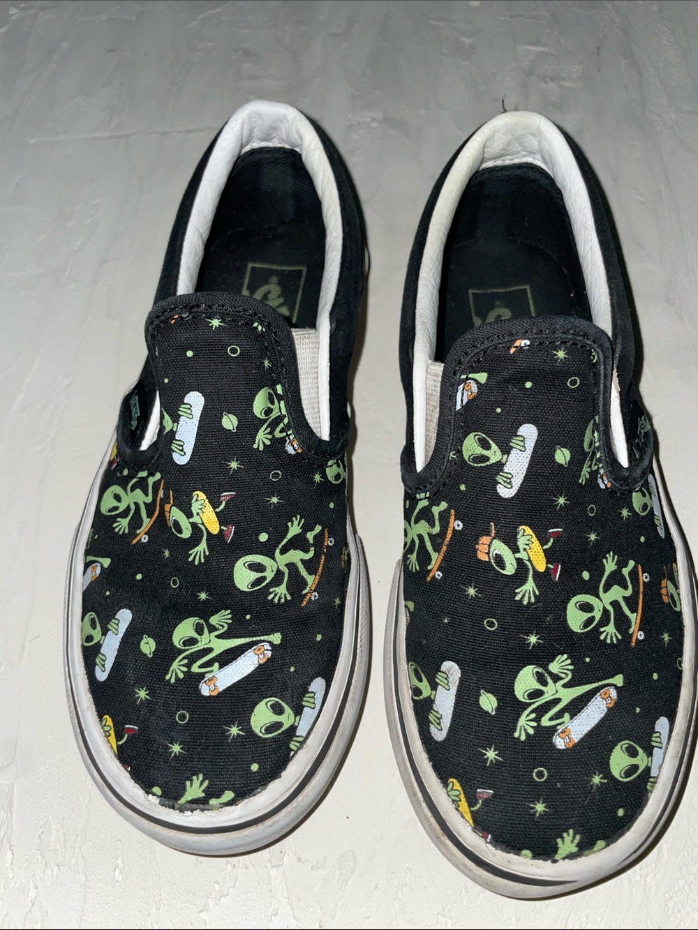 Vans Kids Slip-On Sneakers with Green Alien & Skateboard Print - Black